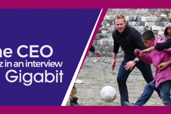 Daraz CEO Bjarke Mikkelsen playing soccer with local kids